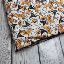 Load image into Gallery viewer, Ready to Ship Rib Knit fabric Vintage Halloween Rainbow Seasons makes great bows, head wraps, bummies, and more.