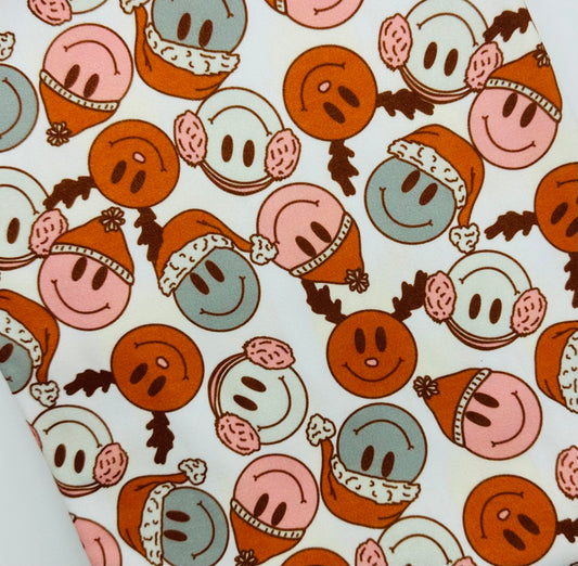 Ready To Ship Velvet knit fabric Boho Christmas Smiley Faces makes great bows, head wraps, bummies, and more.