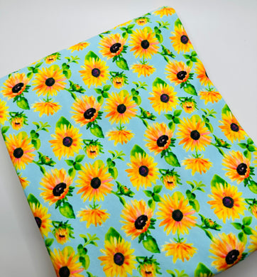 Ready to Ship French Terry Sky Blue Sunflower Floral makes great bows, head wraps, bummies, and more.