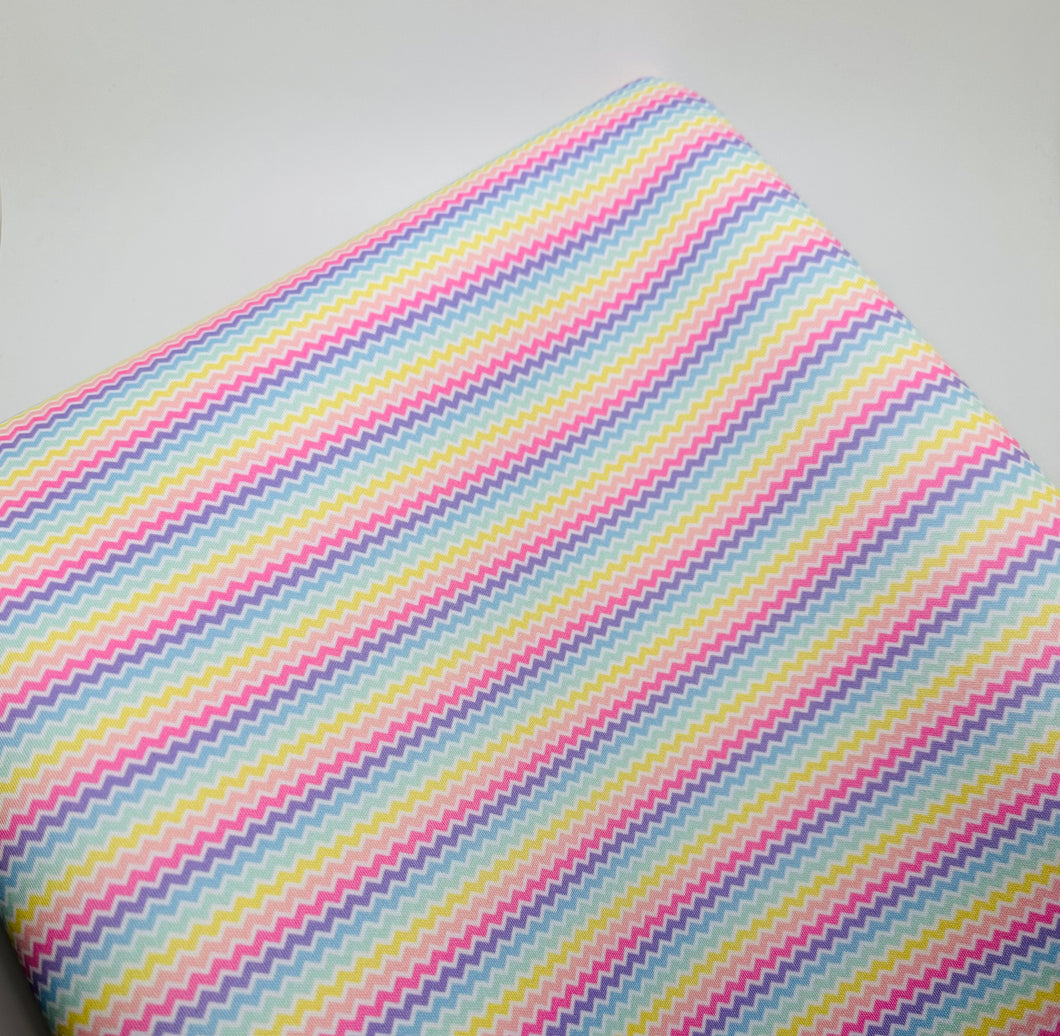 Ready to Ship French Terry Easter Rainbow Chevron Shapes makes great bows, head wraps, bummies, and more.