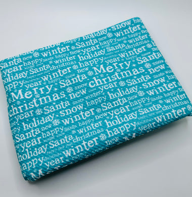 Ready to Ship Bullet fabric Teal Christmas Sayings makes great bows, head wraps, bummies, and more.