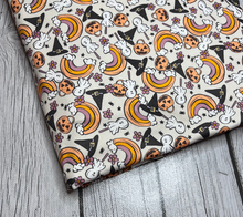 Load image into Gallery viewer, Ready to Ship DBP fabric Vintage Halloween Rainbow Seasons makes great bows, head wraps, bummies, and more.