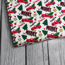 Load image into Gallery viewer, Ready To Ship DBP knit fabric Merry Christmas Trucks makes great bows, head wraps, bummies, and more.