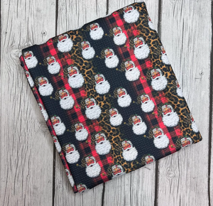 Ready to Ship Bullet fabric Cheetah Buffalo Plaid Santa Christmas Animal makes great bows, head wraps, bummies, and more.