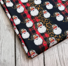 Load image into Gallery viewer, Ready to Ship Bullet fabric Cheetah Buffalo Plaid Santa Christmas Animal makes great bows, head wraps, bummies, and more.