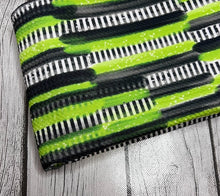 Load image into Gallery viewer, Ready to Ship Bullet knit fabric Beetlejuice Brushstrokes Halloween Shapes makes great bows, head wraps,  bummies, and more.