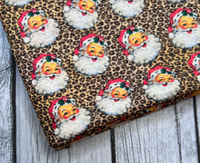 Load image into Gallery viewer, Ready to Ship Bullet Cheetah Santa Christmas makes great bows, head wraps, bummies, and more.