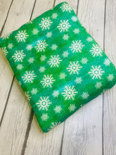 Load image into Gallery viewer, Ready to Ship DBP fabric Green Snowflakes makes great bows, head wraps, bummies, and more.