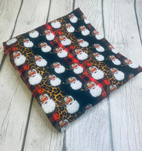 Load image into Gallery viewer, Ready to Ship DBP fabric Cheetah Buffalo Plaid Santa Christmas Animal makes great bows, head wraps, bummies, and more.