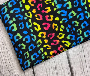 Pre-Order Bullet, DBP, Velvet and Rib Knit fabric Rainbow Leopard w/Black Background Animals makes great bows, head wraps, bummies, and more.