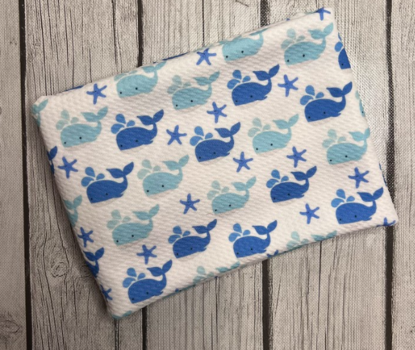 Ready to Ship Bullet Light Blue Whales Animal Boy Print makes great bows, head wraps, bummies, and more.
