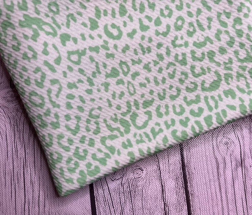 Ready to Ship Bullet fabric Mint Green Cheetah Animals makes great bows, head wraps, bummies, and more.