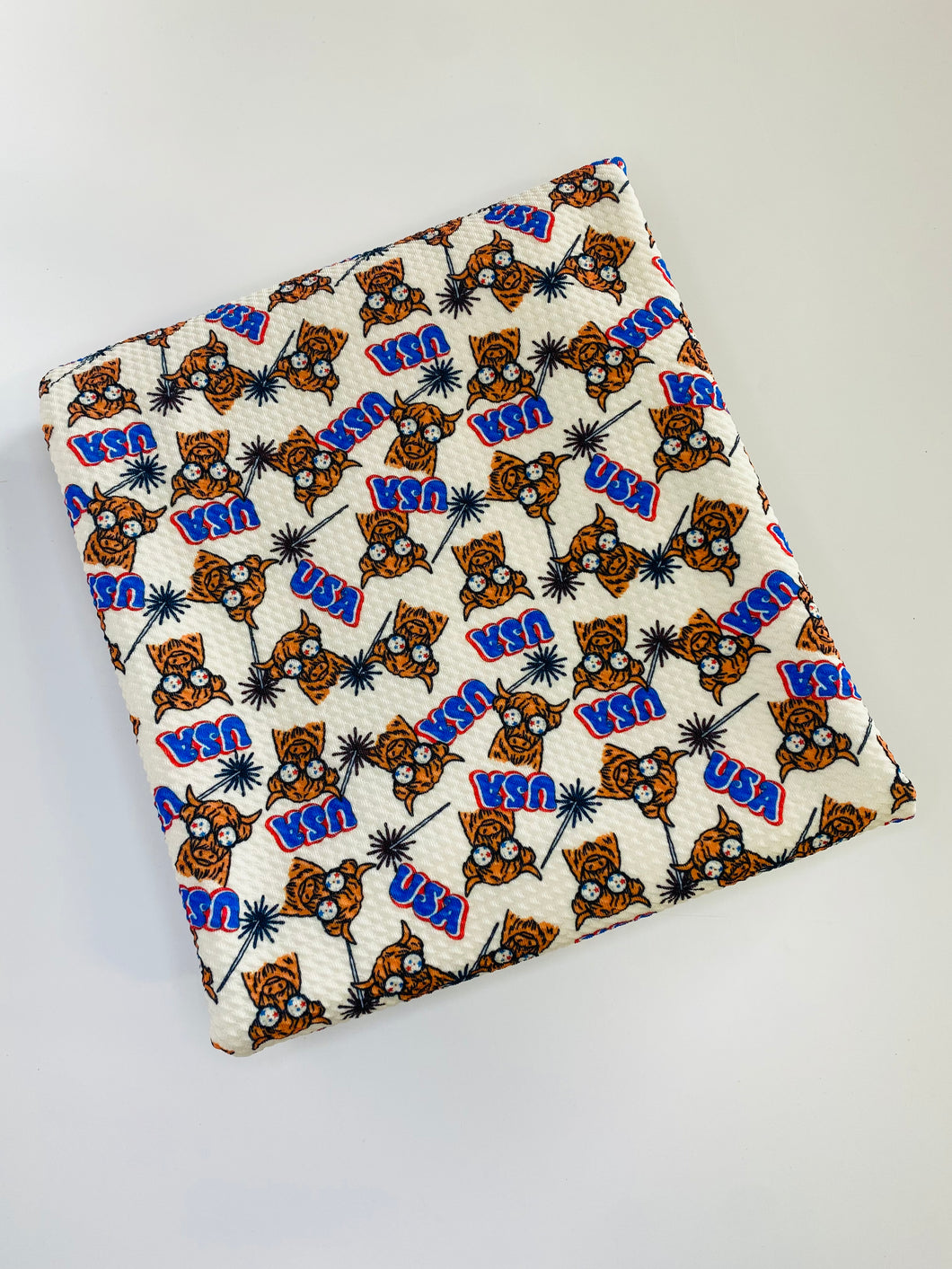 Ready to Ship Bullet fabric Fourth of July Highland Cow Animals makes great bows, head wraps, bummies, and more.