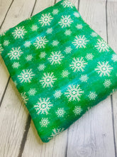 Load image into Gallery viewer, Ready to Ship DBP fabric Green Snowflakes makes great bows, head wraps, bummies, and more.