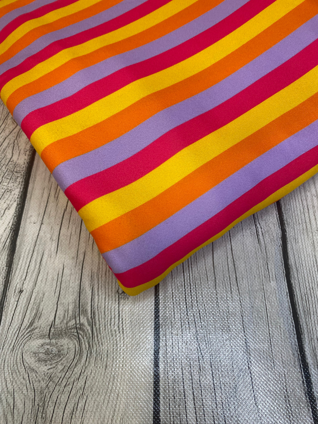 Ready to Ship DBP Fabric Bright Summer Stripes Shapes makes great bows, head wraps, bummies, and more.